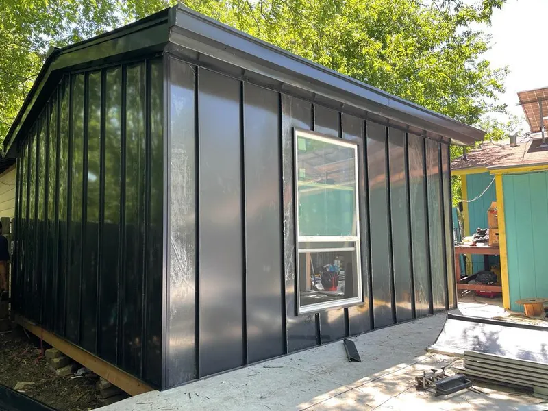 Black standing seam metal wall panels for Roof Inspection in Whitehall